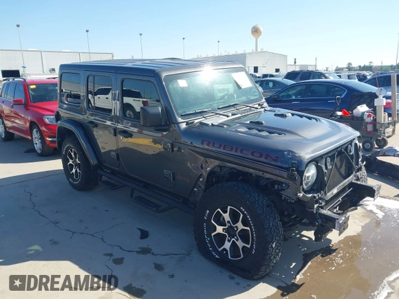 2020 Jeep Wrangler Unlimited Rubicon z VIN 1C4HJXFN0LW300344, wystawiony jako IAAI lot #41943662 z przebiegiem 59 051 mil mil oraz . Historia ofert i sprzedaży dostępna na DreamBid. Obrazek 1.