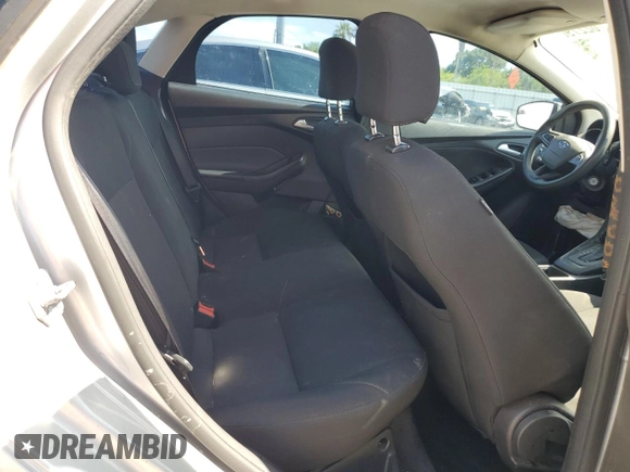 2016 Ford Focus SE z VIN 1FADP3F24GL309119, wystawiony jako Copart lot #62279095 z przebiegiem 117 535 mil mil oraz Szkoda całkowita • Salvage title. Historia ofert i sprzedaży dostępna na DreamBid. Obrazek 10.