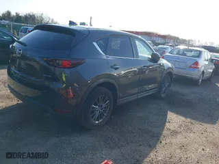 2020 Mazda CX-5 Touring with VIN JM3KFACM2L0786598, listed as a IAAI auction lot 41933368 with 93,657 mi miles. Bid and sale history available at carsss.com. Image 4.