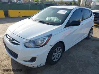 2014 Hyundai Accent GS with VIN KMHCT5AE8EU155466, listed as a IAAI auction lot 41905867 with 129,178 mi miles. Bid and sale history available at carsss.com. Image 2.