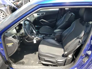 2012 Hyundai Veloster w/Red Int with VIN KMHTC6AD2CU048049, listed as a Copart auction lot 63796274 with 122,914 mi miles and Salvage title. Bid and sale history available at DreamBid. Image 7.