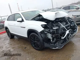 2024 Volkswagen Atlas SE z VIN 1V2KE2CA0RC251671, wystawiony jako IAAI lot #41094446 z przebiegiem 5 323 mil mil oraz . Historia ofert i sprzedaży dostępna na DreamBid. Obrazek 1.