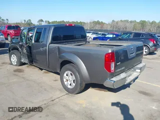 2009 Nissan Frontier LE with VIN 1N6AD09U79C402623, listed as a IAAI auction lot 41656385 with 286,777 mi miles and . Bid and sale history available at DreamBid. Image 3.