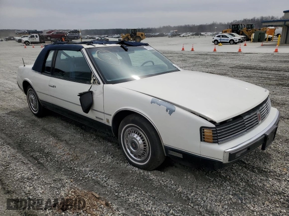 1987 Oldsmobile Toronado with VIN 1G3EZ1130HU307201, listed as a Copart auction lot 49290815 with 104,837 mi miles and Salvage Title. Bid and sale history available at DreamBid. Image 4.