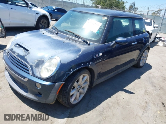 2006 MINI Hardtop S with VIN WMWRE33536TJ35740, listed as a IAAI auction lot 42720196 with 165,852 mi miles and . Bid and sale history available at DreamBid. Image 2.