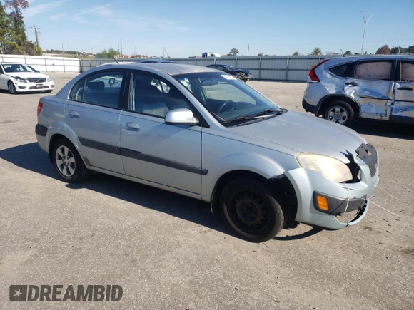 2007 Kia Rio LX with VIN KNADE123376228255, listed as a Copart auction lot 82205954 with 178,823 mi miles and Salvage Title. Bid and sale history available at carsss.com. Image 4.