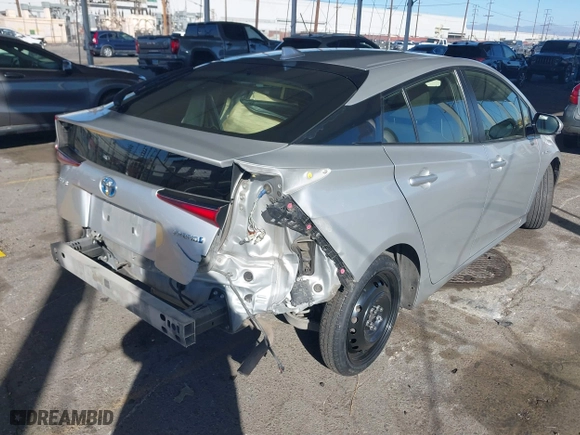 2019 Toyota Prius L Eco with VIN JTDKARFU3K3082893, listed as a IAAI auction lot 41370727 with 217,582 mi miles. Bid and sale history available at carsss.com. Image 4.