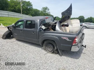 2010 Toyota Tacoma PreRunner with VIN 5TEJU4GN7AZ711911, listed as a Copart auction lot 60200385 with 209,579 mi miles and Salvage title. Bid and sale history available at DreamBid. Image 2.