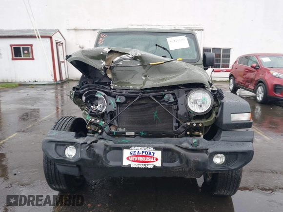 2021 Jeep Wrangler Unlimited Willys with VIN 1C4HJXDN5MW592125, listed as a IAAI auction lot 40821100 with 82,109 mi miles and . Bid and sale history available at DreamBid. Image 12.