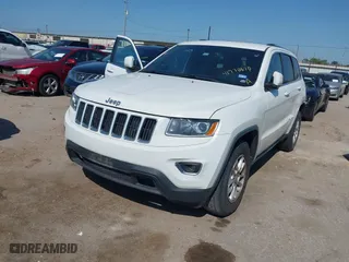 2014 Jeep Grand Cherokee Laredo with VIN 1C4RJEAG2EC107005, listed as a IAAI auction lot 41970670 with 299,211 mi miles. Bid and sale history available at carsss.com. Image 2.