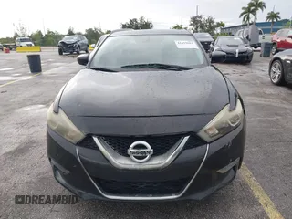 2016 Nissan Maxima SR with VIN 1N4AA6AP9GC428938, listed as a IAAI auction lot 42419663 with 121,501 mi miles and . Bid and sale history available at DreamBid. Image 12.