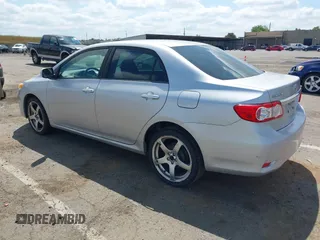 2011 Toyota Corolla L with VIN JTDBU4EE9B9156724, listed as a IAAI auction lot 42138344 with 96,486 mi miles and . Bid and sale history available at DreamBid. Image 3.