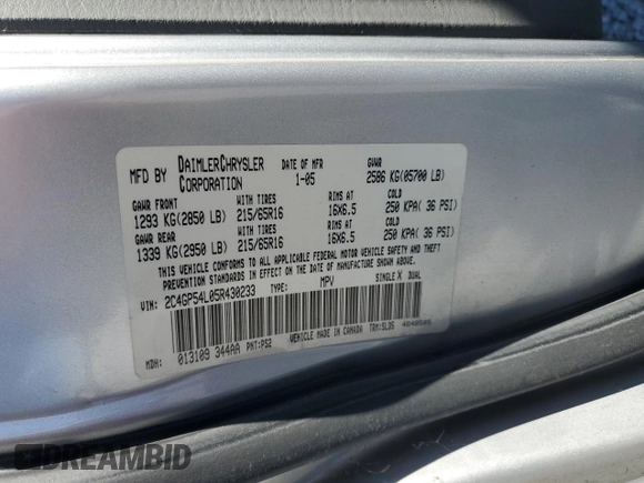 2005 Chrysler Town & Country Touring z VIN 2C4GP54L05R430233, wystawiony jako Copart lot #56189765 z przebiegiem 190 187 mil mil oraz Szkody całkowita. Historia ofert i sprzedaży dostępna na DreamBid. Obrazek 13.