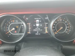 2023 Jeep Gladiator Rubicon with VIN 1C6JJTBG7PL573197, listed as a Copart auction lot 53866075 with 19,521 mi miles and Salvage title. Bid and sale history available at DreamBid. Image 9.
