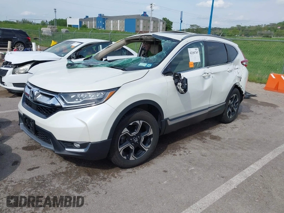 2018 Honda CR-V Touring with VIN 5J6RW2H99JL020598, listed as a IAAI auction lot 42104765 with 30,431 mi miles and . Bid and sale history available at carsss.com. Image 2.