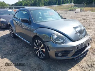 2013 Volkswagen Beetle Turbo R-Line z VIN 3VWVT7AT1DM673264, wystawiony jako IAAI lot #42414184 z przebiegiem 101 211 mil mil oraz . Historia ofert i sprzedaży dostępna na DreamBid. Obrazek 1.
