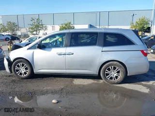 2011 Honda Odyssey EX-L with VIN 5FNRL5H6XBB057556, listed as a IAAI auction lot 41808620 with 154,449 mi miles. Bid and sale history available at carsss.com. Image 14.