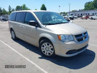 2015 Dodge Grand Caravan American Value with VIN 2C4RDGBG3FR647957, listed as a IAAI auction lot 42147813 with 129,859 mi miles and . Bid and sale history available at DreamBid. Image 1.