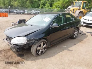 2009 Volkswagen Jetta SE with VIN 3VWRZ71K29M078499, listed as a IAAI auction lot 42399407 with 124,484 mi miles and . Bid and sale history available at DreamBid. Image 2.