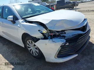 2021 Toyota Camry Hybrid LE with VIN 4T1C31AK2MU027513, listed as a IAAI auction lot 41856681 with 85,779 mi miles. Bid and sale history available at carsss.com. Image 6.