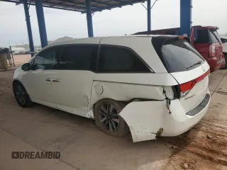 2017 Honda Odyssey Touring with VIN 5FNRL5H94HB007979, listed as a Copart auction lot 56755435 with 125,821 mi miles and Salvage title. Bid and sale history available at DreamBid. Image 2.