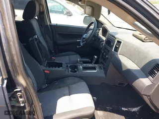 2009 Jeep Grand Cherokee Laredo with VIN 1J8GS48K79C539659, listed as a IAAI auction lot 42063431 with 1 mi miles. Bid and sale history available at carsss.com. Image 5.