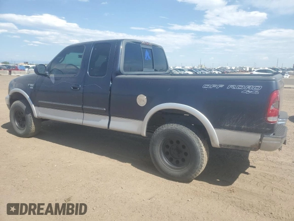 2001 Ford F-150 XL with VIN 1FTRX18L71NA27627, listed as a Copart auction lot 64190715 with 105,503 mi miles and Salvage title. Bid and sale history available at DreamBid. Image 2.