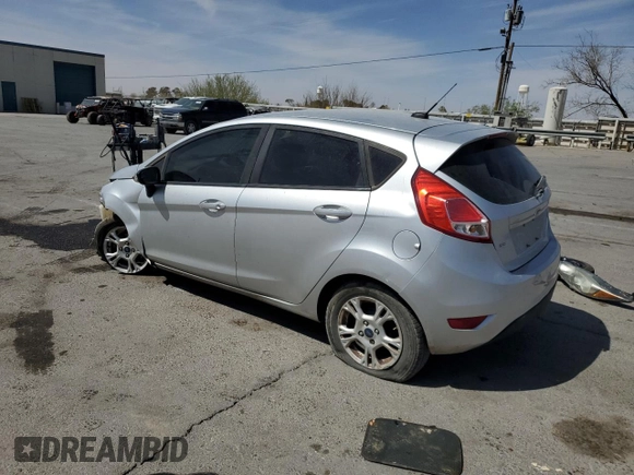 2015 Ford Fiesta SE with VIN 3FADP4EJ2FM176548, listed as a Copart auction lot 50770015 with 129,006 mi miles and Salvage Title. Bid and sale history available at carsss.com. Image 2.