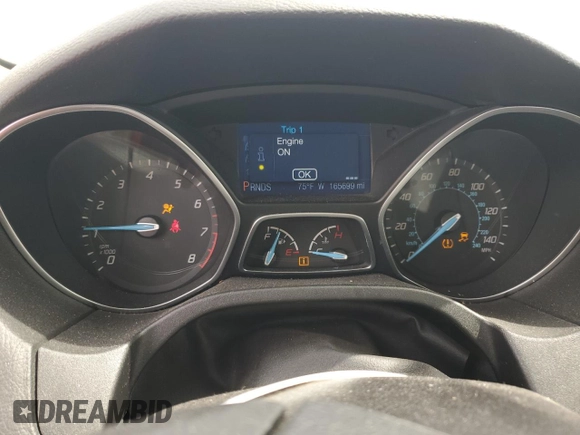 2013 Ford Focus SE z VIN 1FADP3F28DL292238, wystawiony jako Copart lot #51016715 z przebiegiem 165 699 mil mil oraz Szkoda całkowita • Salvage title. Historia ofert i sprzedaży dostępna na DreamBid. Obrazek 9.
