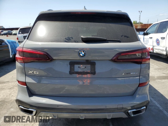 2023 BMW X5 xDrive45e with VIN 5UXTA6C0XP9P49482, listed as a Copart auction lot 56730735 with Not provided miles and Salvage title. Bid and sale history available at DreamBid. Image 6.