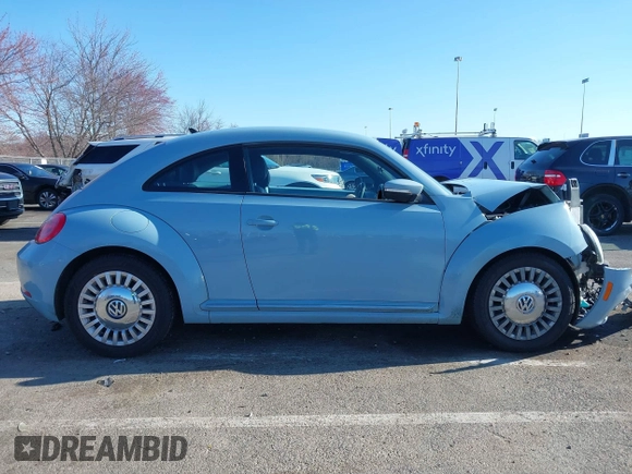 2014 Volkswagen Beetle 2.5L w/Sun with VIN 3VWJP7AT6EM601318, listed as a IAAI auction lot 41902598 with 169,220 mi miles and . Bid and sale history available at DreamBid. Image 13.