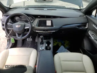 2021 Cadillac XT4 AWD Sport with VIN 1GYFZFR43MF054379, listed as a Copart auction lot 55338315 with 53,693 mi miles and Salvage title. Bid and sale history available at DreamBid. Image 8.