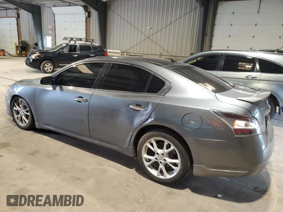 2014 Nissan Maxima SV with VIN 1N4AA5AP6EC912167, listed as a Copart auction lot 61301315 with 124,373 mi miles and Salvage title. Bid and sale history available at DreamBid. Image 2.
