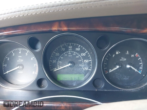 2004 Jaguar XJ with VIN SAJEA74C94SG11224, listed as a IAAI auction lot 41732975 with 204,815 mi miles and . Bid and sale history available at DreamBid. Image 7.