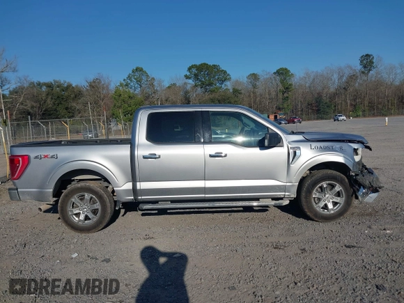 2021 Ford F-150 XL with VIN 1FTFW1E58MFA73753, listed as a IAAI auction lot 41707310 with 138,450 mi miles. Bid and sale history available at carsss.com. Image 13.