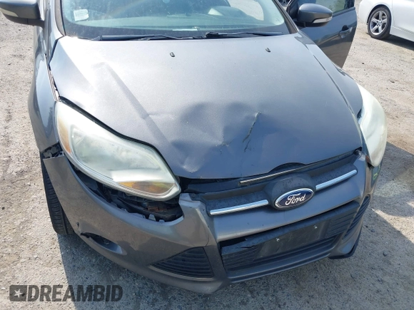 2013 Ford Focus SE with VIN 1FADP3F28DL233822, listed as a IAAI auction lot 42583041 with 135,728 mi miles and . Bid and sale history available at DreamBid. Image 6.