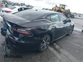 2020 Nissan Maxima SV z VIN 1N4AA6CV3LC369536, wystawiony jako IAAI lot #41793232 z przebiegiem 91 483 mil mil oraz . Historia ofert i sprzedaży dostępna na DreamBid. Obrazek 4.