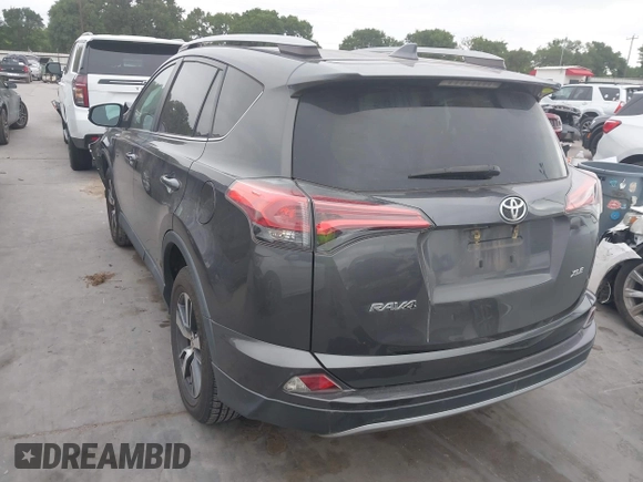2018 Toyota RAV4 XLE with VIN 2T3WFREV1JW512476, listed as a IAAI auction lot 42177733 with 132,207 mi miles and . Bid and sale history available at DreamBid. Image 3.