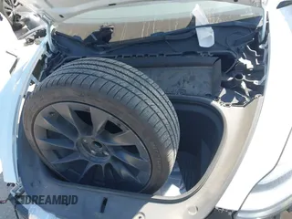 2021 Tesla Model Y Long Range with VIN 5YJYGDEE0MF265339, listed as a IAAI auction lot 41975058 with 51,292 mi miles and . Bid and sale history available at DreamBid. Image 10.