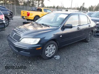 2003 Mitsubishi Lancer ES with VIN JA3AJ26E83U006060, listed as a IAAI auction lot 41254660 with 220,490 mi miles. Bid and sale history available at carsss.com. Image 17.