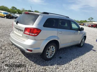 2014 Dodge Journey SXT z VIN 3C4PDCBG7ET126901, wystawiony jako Copart lot #52882625 z przebiegiem 176 923 mil mil oraz Szkoda całkowita • Salvage title. Historia ofert i sprzedaży dostępna na DreamBid. Obrazek 3.
