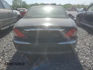 2002 Jaguar X-Type z VIN SAJEA51C02WC53526, wystawiony jako Copart lot #53761265 z przebiegiem 156 584 mil mil oraz Czysty tytuł • Clean title. Historia ofert i sprzedaży dostępna na DreamBid. Obrazek 6.