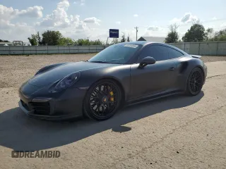 2014 Porsche 911 Turbo with VIN WP0AD2A90ES167116, listed as a Copart auction lot 69284504 with 67,701 mi miles and Salvage Title. Bid and sale history available at carsss.com. Image 1.