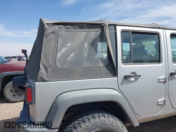 2008 Jeep Wrangler Unlimited X with VIN 1J4GA39198L651172, listed as a IAAI auction lot 41936521 with 69,007 mi miles and . Bid and sale history available at DreamBid. Image 6.