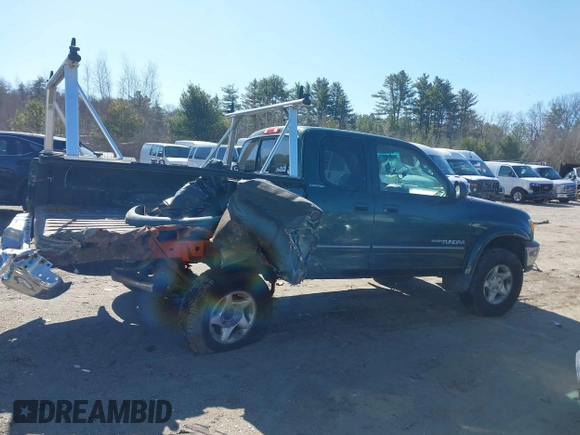 2000 Toyota Tundra Limited with VIN 5TBBT4815YS065867, listed as a IAAI auction lot 41995501 with 208,889 mi miles. Bid and sale history available at carsss.com. Image 13.