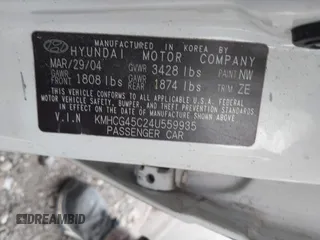 2004 Hyundai Accent GL z VIN KMHCG45C24U559935, wystawiony jako IAAI lot #40487927 z przebiegiem Nie podano mil oraz . Historia ofert i sprzedaży dostępna na DreamBid. Obrazek 9.