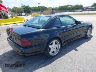 2001 Mercedes-Benz SL-Class with VIN WDBFA68F71F196390, listed as a IAAI auction lot 42128119 with 65,010 mi miles. Bid and sale history available at carsss.com. Image 4.
