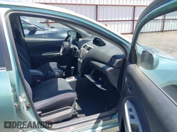 2008 Toyota Yaris with VIN JTDBT923X81201731, listed as a IAAI auction lot 42222388 with 91,079 mi miles. Bid and sale history available at carsss.com. Image 5.