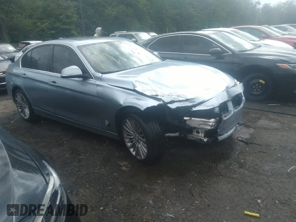 2013 BMW 3 Series 328i with VIN WBA3A5G54DNP25843, listed as a IAAI auction lot 39515836 with 104,045 mi miles. Bid and sale history available at carsss.com. Image 1.