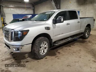 2016 Nissan Titan SL z VIN 1N6BA1F44GN510707, wystawiony jako Copart lot #57948665 z przebiegiem 89 723 mil mil oraz Tytuł czysty. Historia ofert i sprzedaży dostępna na DreamBid. Obrazek 1.
